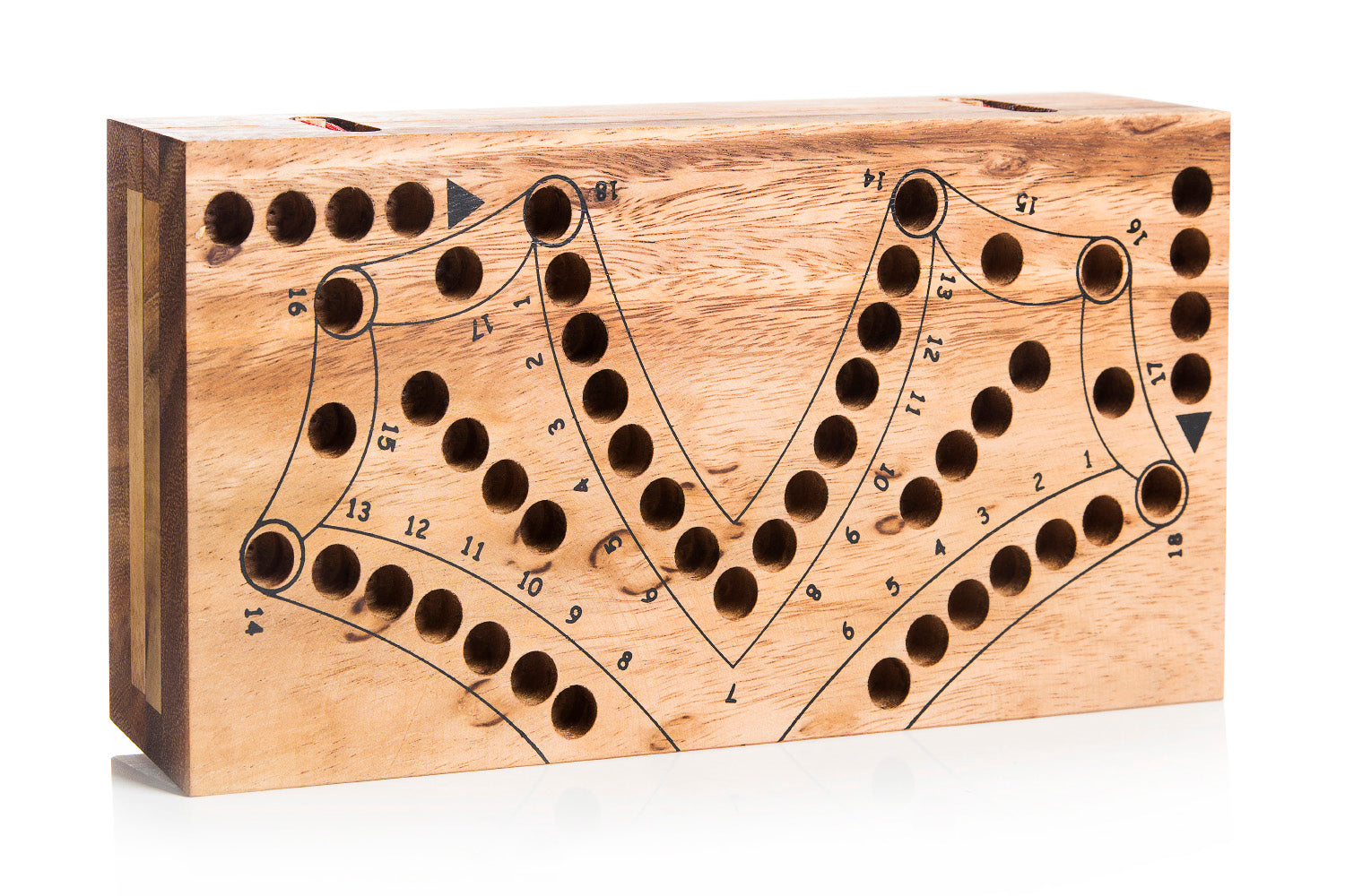 Wooden cribbage board with pegs on a white background