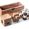 Wooden puzzle boxes of various sizes on a white background