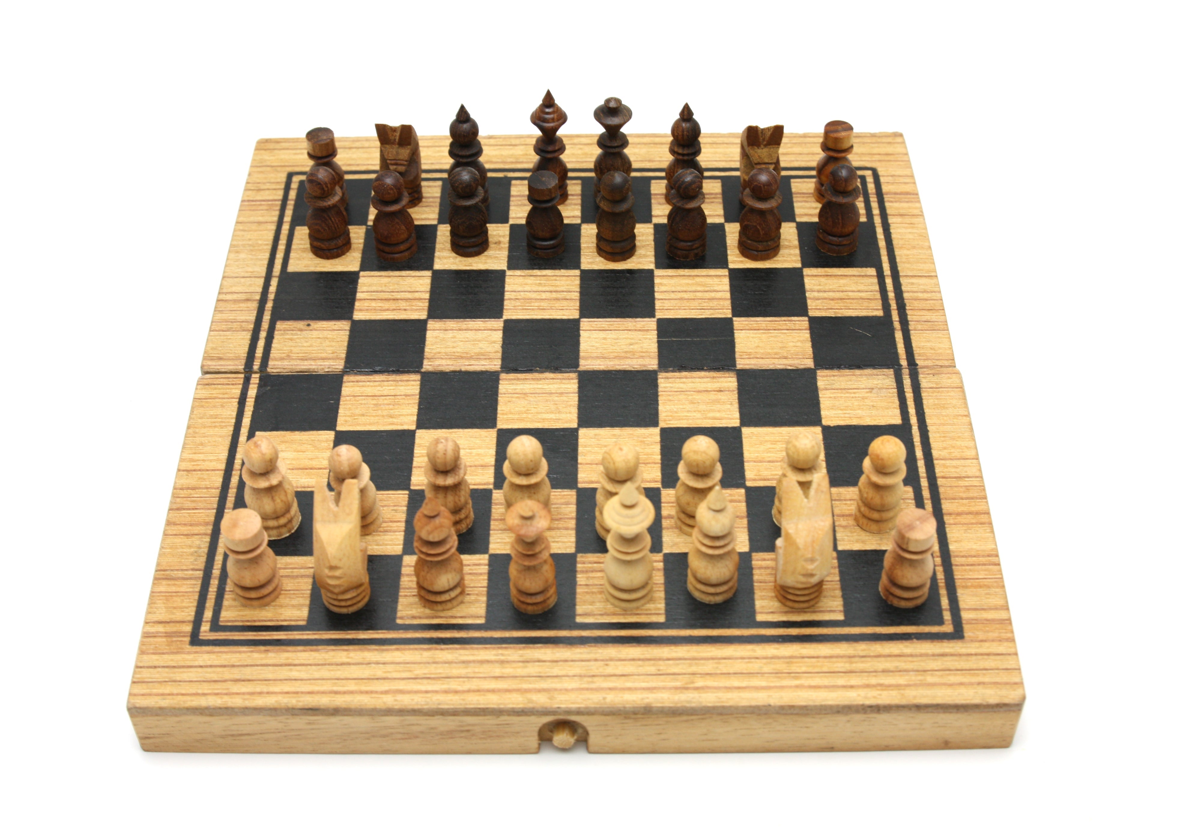 Wooden chessboard with pieces on a white background