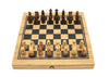 Wooden chessboard with pieces on a white background