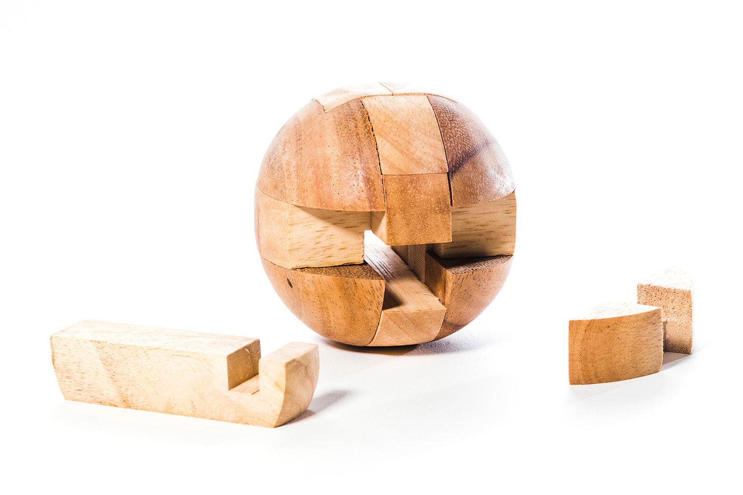 12-piece non-identical wooden mechanical ball puzzle disassembled