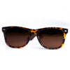 Joycoast Crush walnut wood sunglasses with brown polarized lenses on white background