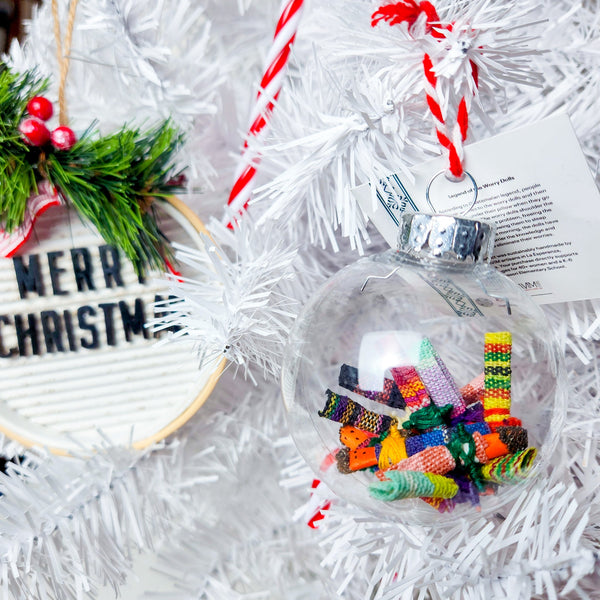 Find peace and tranquility with our Worry Globe Ornament. This enchanting piece features 12 mini worry dolls, inspired by ancient Guatemalan tradition. A perfect gift for any occasion, it's a beautiful and practical way to relieve stress and find serenity.