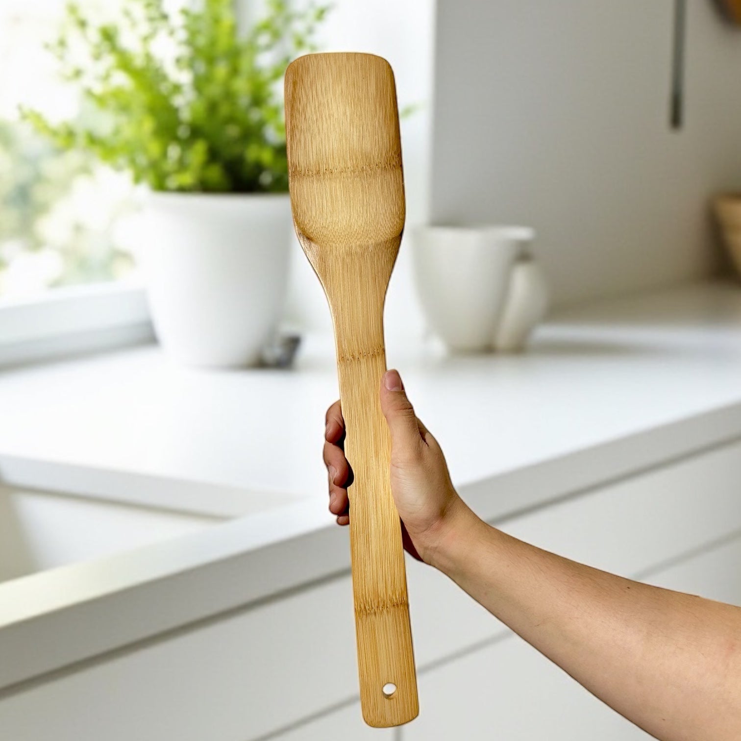 Close-up of the Bamboo XL Barbeque Grilling Spatula's bamboo grain and construction