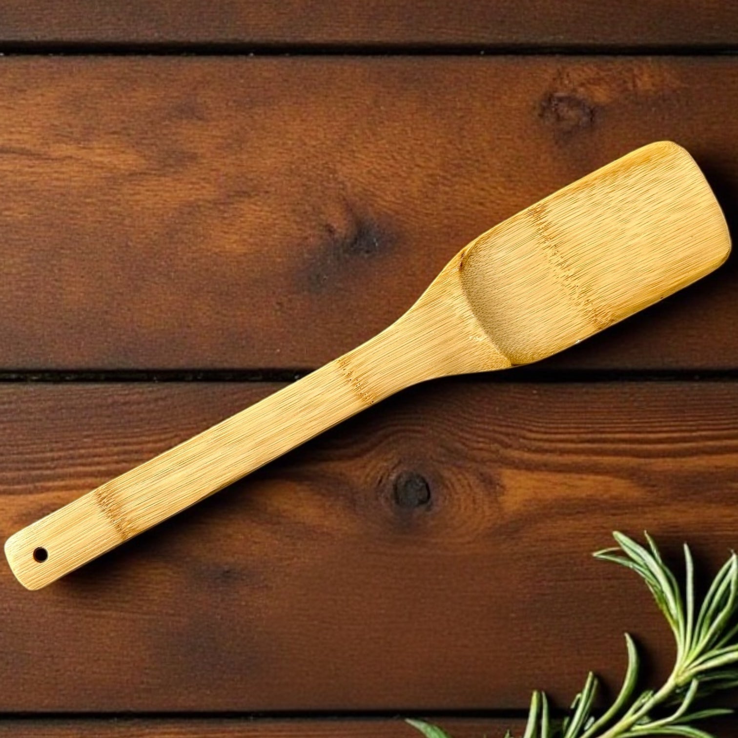 Bamboo XL Barbeque Grilling Spatula laid out showing its extra-long bamboo handle and head