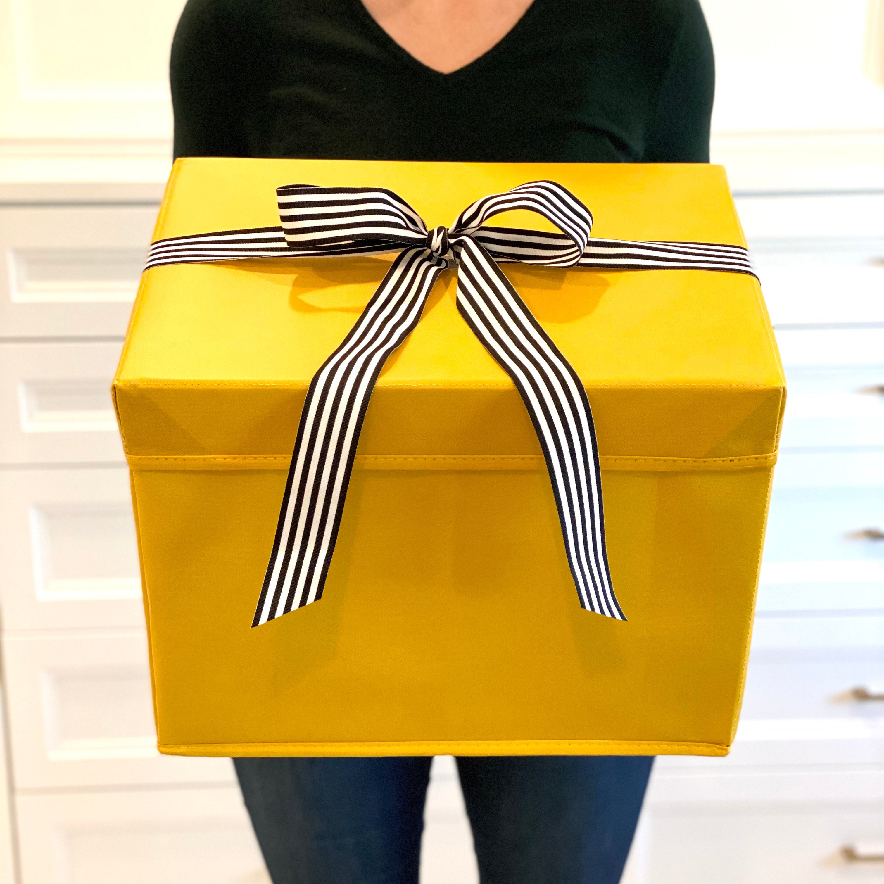 EverBox foldable yellow gift box laid flat to show collapsible storage design
