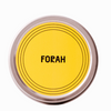 Round container with yellow label and 'FORAH' text on a white background