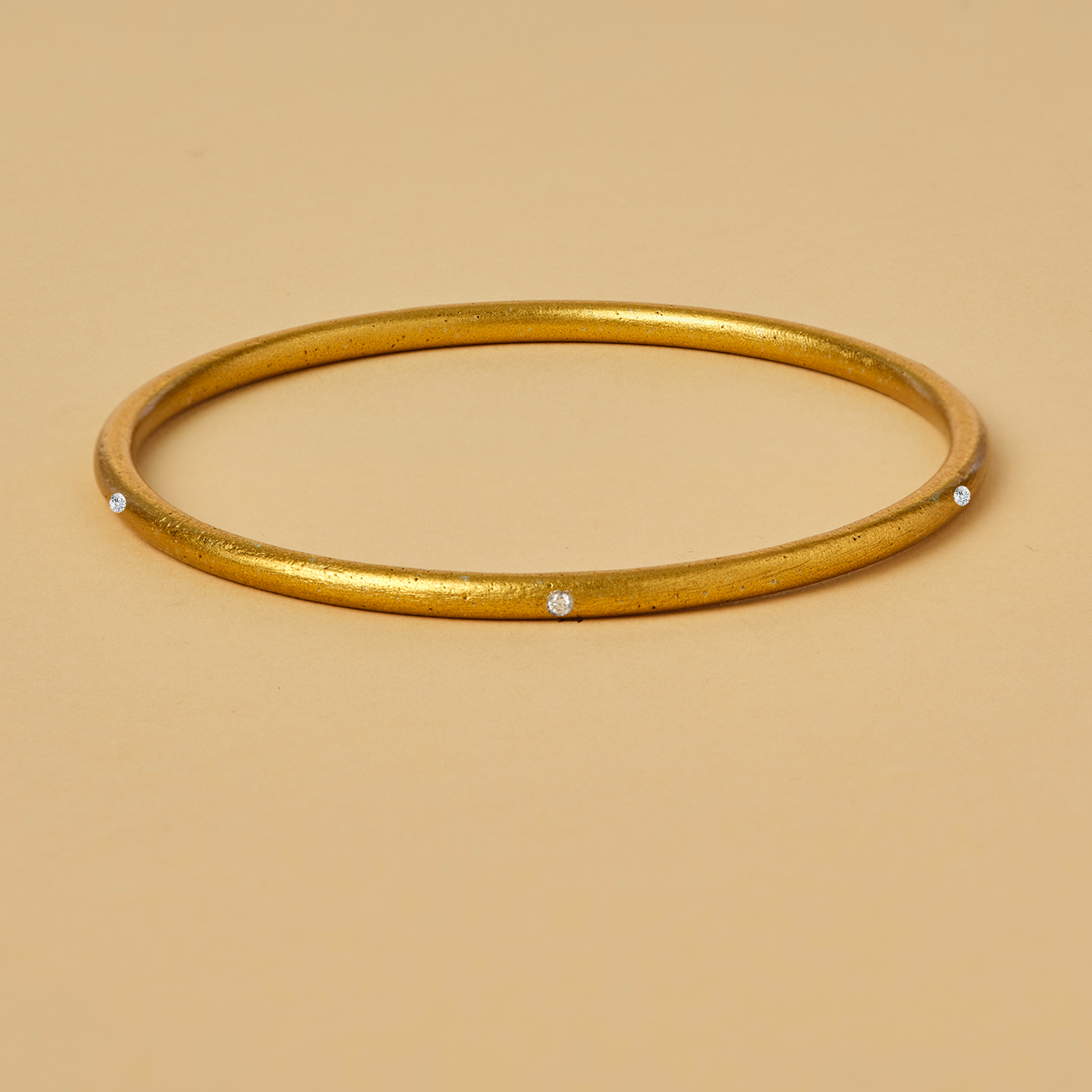 LOVE IS THE BOMB 7 DIAMOND BANGLE: A Symbol of Love, Peace, and Hope