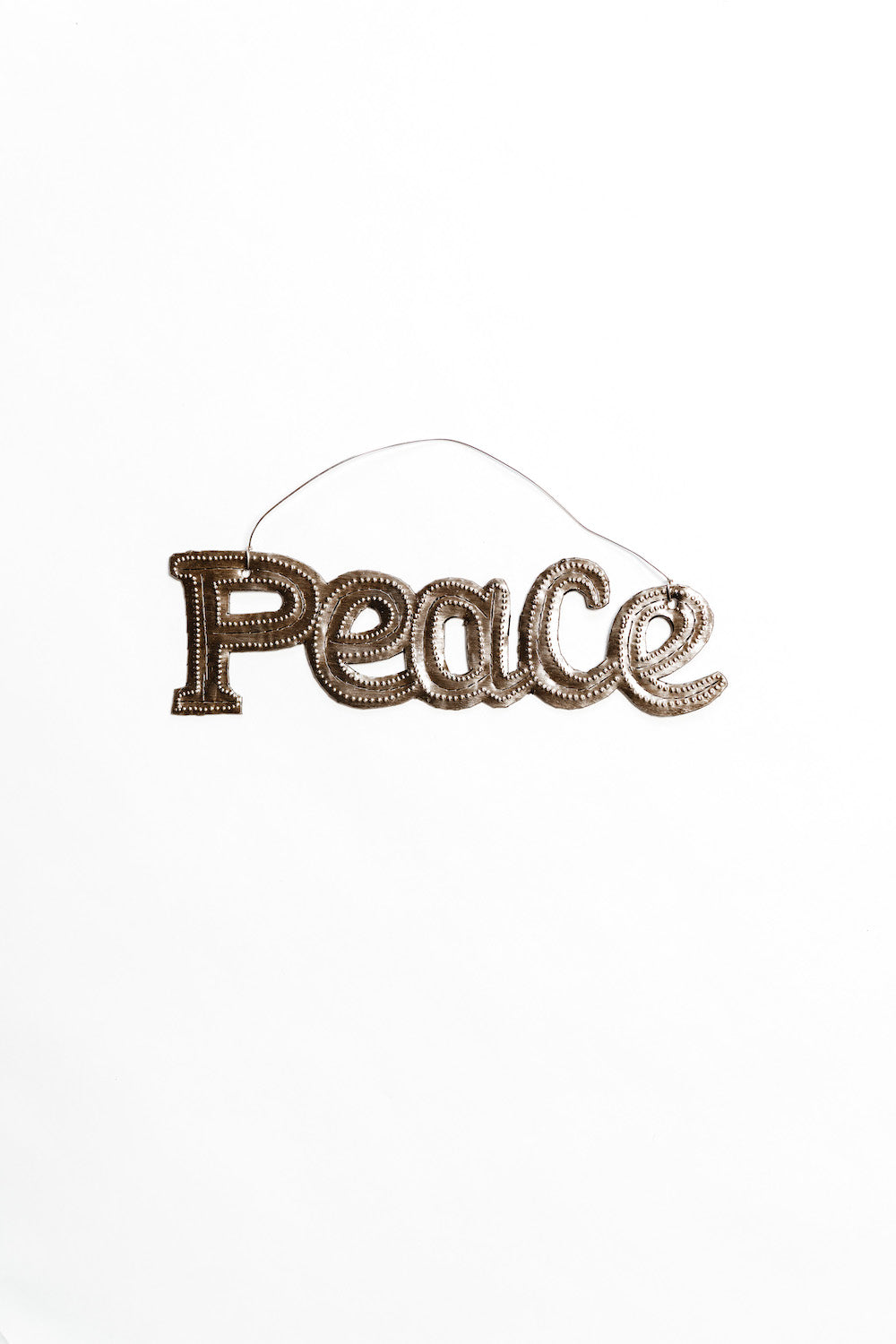 Recycled Steel Peace Ornament - Cultivate a sense of inner peace and harmony with this inspiring word art.