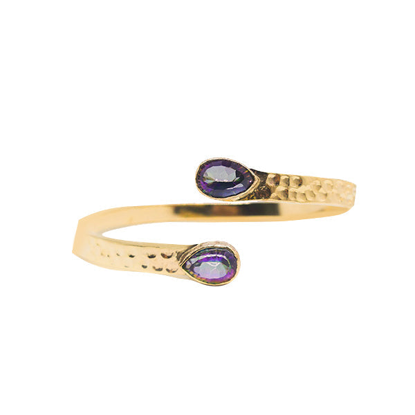 Discover the magic of the KIARA Lower Arm Band. This stunning, sustainable piece features a mystical topaz gemstone and is handcrafted by skilled artisans. Elevate your style and connect with your spiritual side with this timeless accessory.