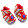 Our best-selling baby booties now come in an adorable flower design - how cute! A soft fleece flower and traditional Guatemalan fabric line the exterior, and each pair has a flannel interior to keep your little one's toes warm. One size fits most infants, what a perfect gift for expecting mothers! In addition, there are no irritating closures - a Velcro strap across the ankle will keep these in place. As always, Handmade and Fair Trade!