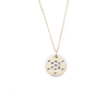 A close-up photo of the sacred geometry design on the pendant
