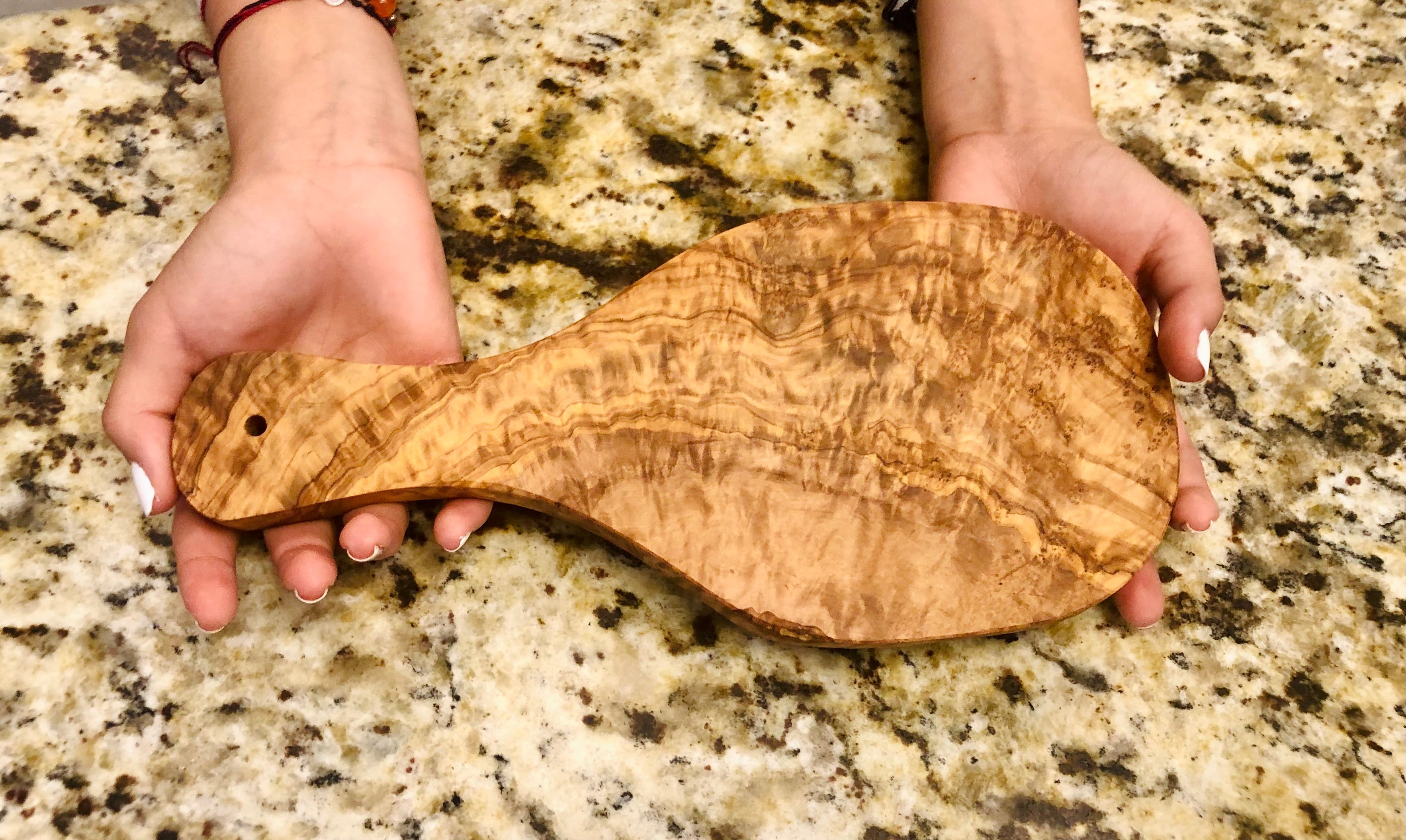 Choixe's Olivewood Cutting Board is handcrafted from sustainable olivewood, offering exceptional beauty and durability. Perfect for chopping, serving, and adding a touch of Mediterranean style to your kitchen. Shop now and experience the unique qualities of olivewood!