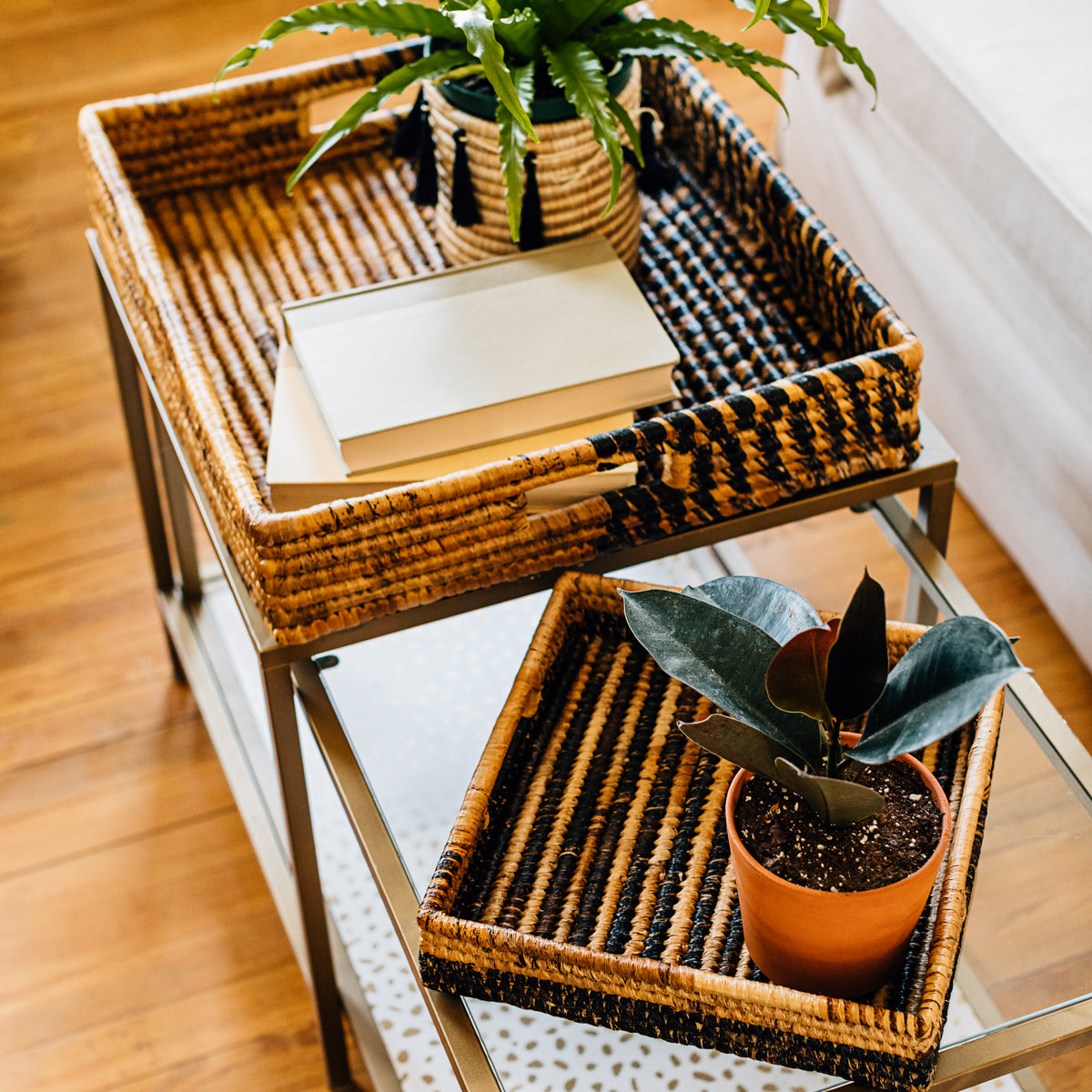 Add a touch of natural beauty to your home with our sustainable Parker Banana Leaf Trays. Handcrafted from banana leaves, these versatile trays are perfect for serving, organizing, and decorating.