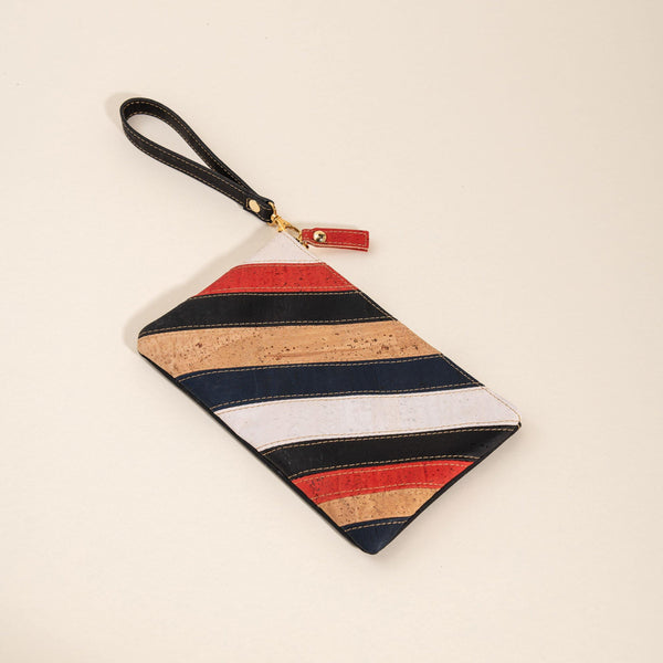 Versatile cork wristlet for on-the-go essentials. Stylish, durable, and eco-friendly. Perfect for travel, work, or casual outings. Holds phone, keys, and more. Order now!