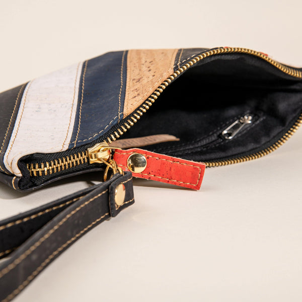 Versatile cork wristlet for on-the-go essentials. Stylish, durable, and eco-friendly. Perfect for travel, work, or casual outings. Holds phone, keys, and more. Order now!