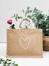 A stylish and sustainable gift bag made from natural jute. Perfect for any occasion, this reusable bag is both beautiful and eco-friendly.