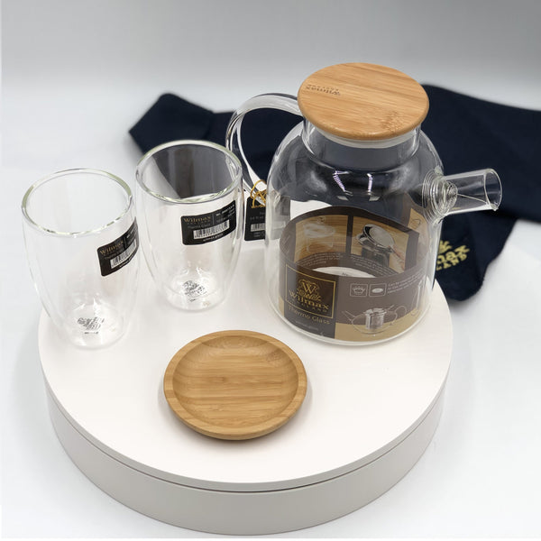Immerse yourself in Asian tea traditions with this exquisite 4-piece set! Hand-blown thermo glass keeps drinks hot or cold for hours, while the elegant bamboo tray adds a touch of Zen. Includes teapot, cups, & plate - perfect for tea lovers & hosts!