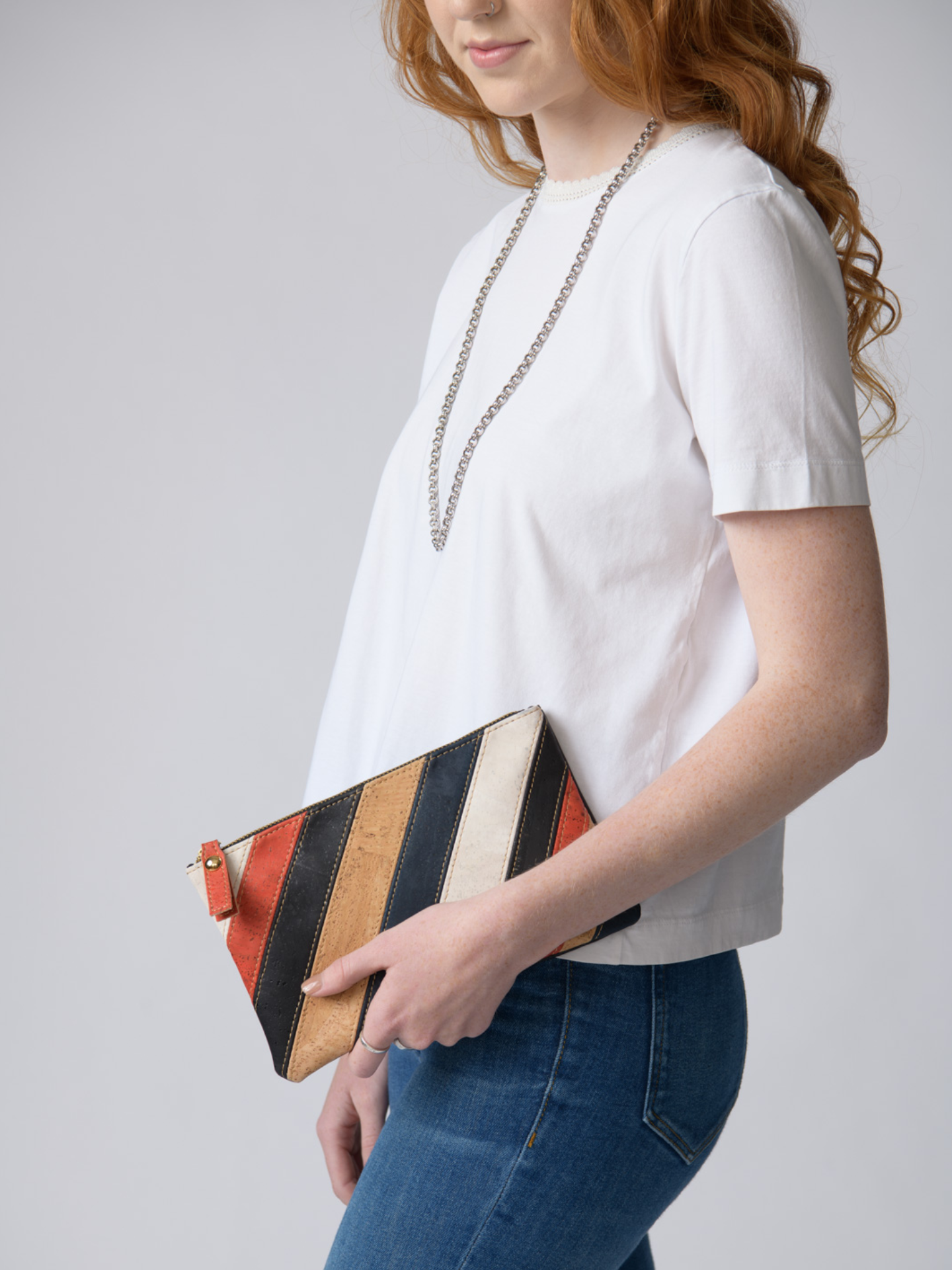 Versatile cork wristlet for on-the-go essentials. Stylish, durable, and eco-friendly. Perfect for travel, work, or casual outings. Holds phone, keys, and more. Order now!