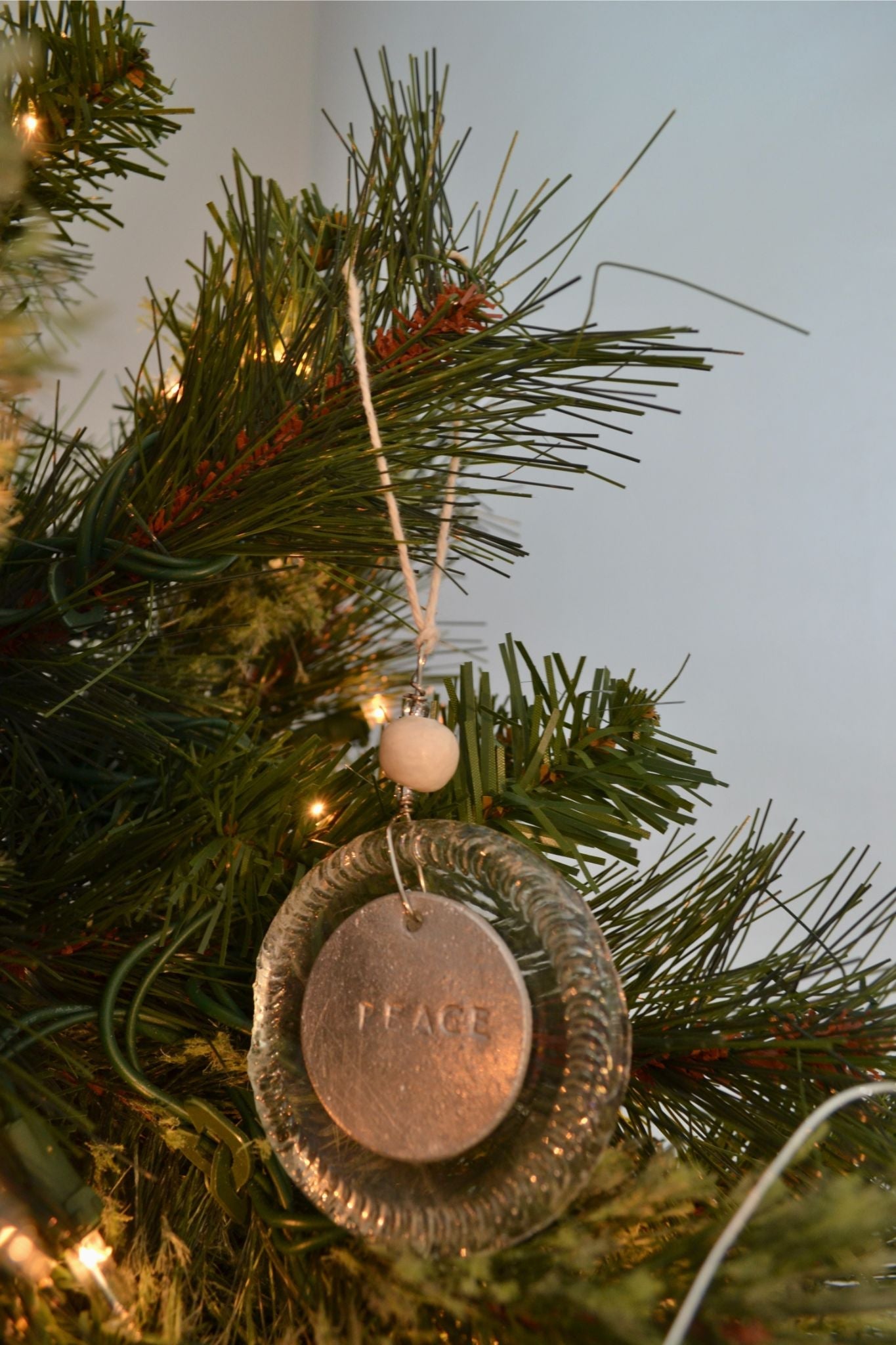 Upcycled Bottle Cap Ornament: A Celebration of Second Stories**