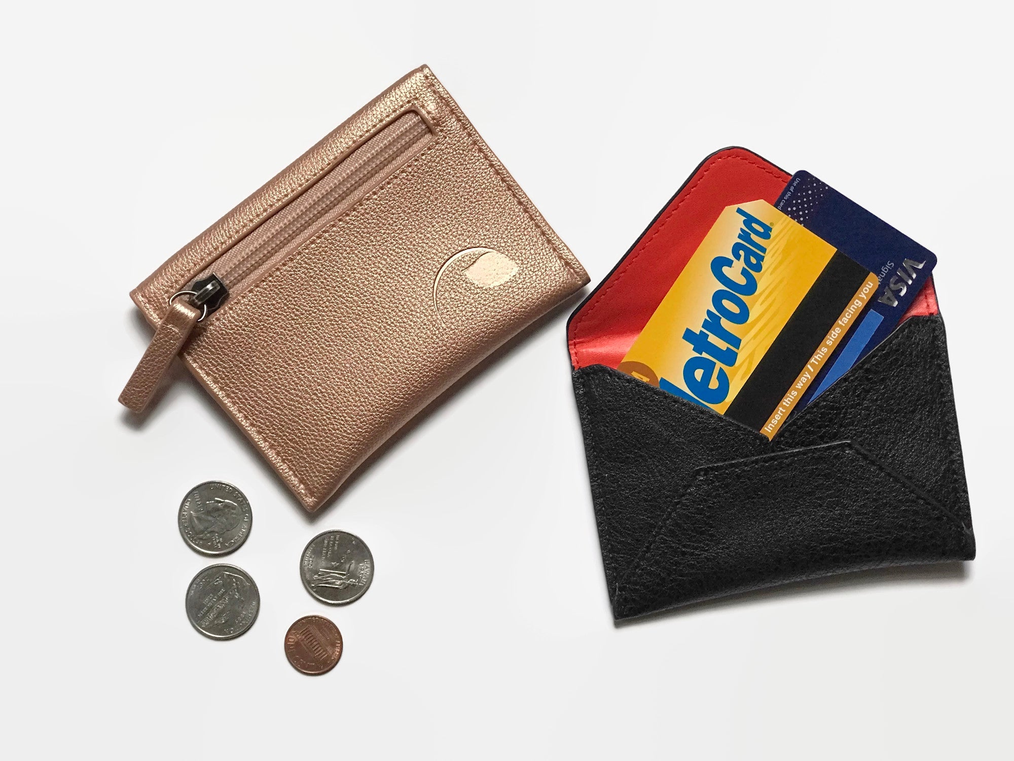 Compact & chic! Baltic Coin Wallet - leather, card & coin organizer, holds 20 cards or 10 credit cards, zippered pouch, orange lining. Black & rose gold. Shop stylish wallets now!