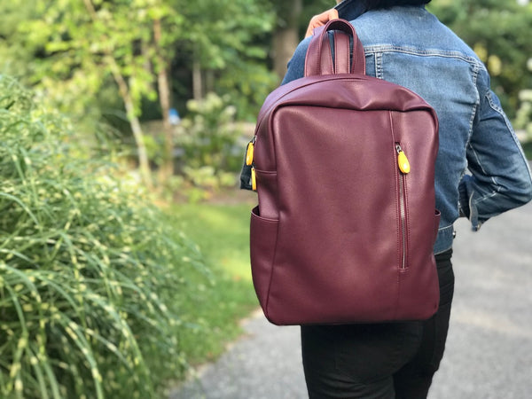 Chic vegan backpack purse! Lenox transitions from office to weekend (spacious, pockets, fits 13" laptop). Water bottle & umbrella pockets. Adjustable straps. Eco-friendly & stylish. Shop now!