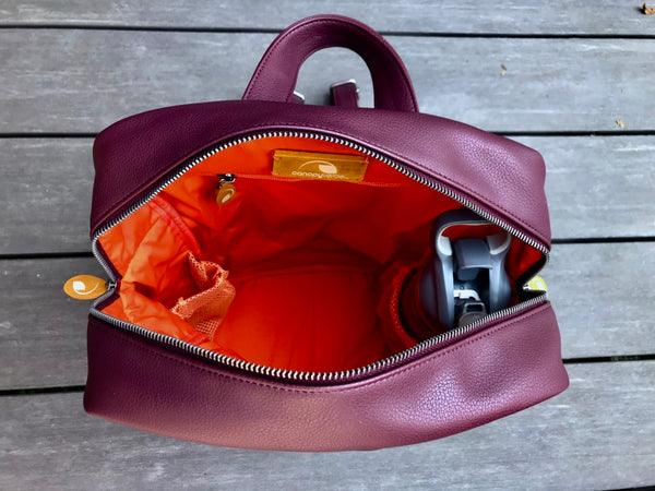 Chic vegan backpack purse! Lenox transitions from office to weekend (spacious, pockets, fits 13" laptop). Water bottle & umbrella pockets. Adjustable straps. Eco-friendly & stylish. Shop now!
