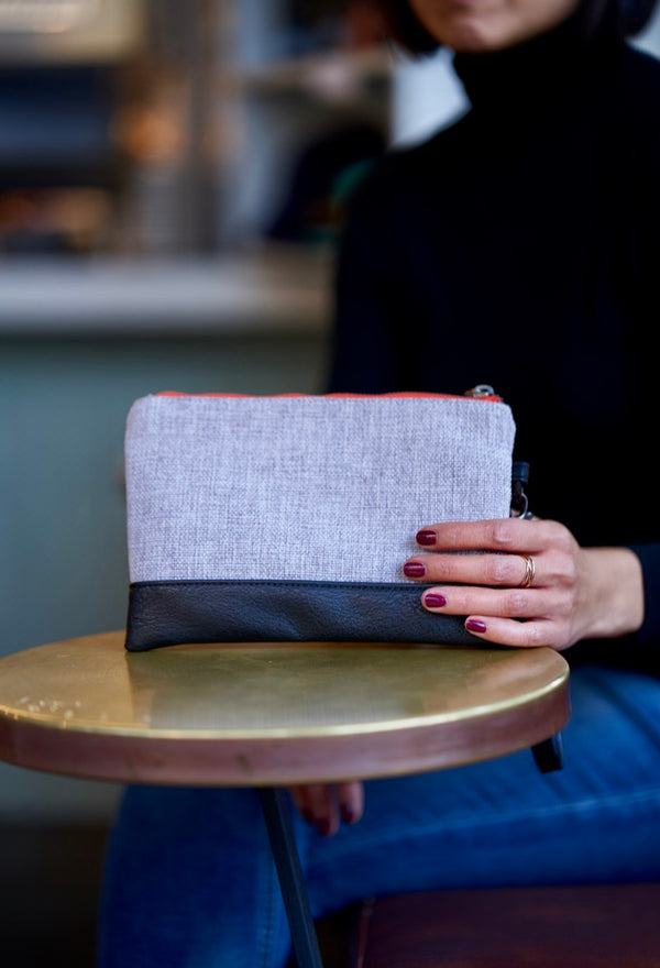 Chic & versatile! Gowanus Wristlet is a wallet, phone holder & passport case. Fits iPhone & Galaxy. Vegan leather, zippered pockets, bright lining. Travel & everyday style. Shop now!