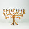 Add a touch of nature and meaning to your Hanukkah celebrations with our eco-friendly Tree of Life Menorah. Made from sustainable bamboo and featuring a beautiful design, this menorah is perfect for any occasion. Order yours today!