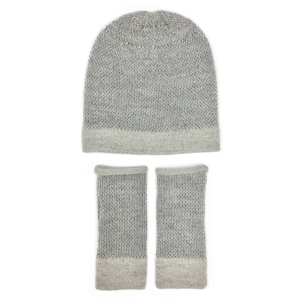 Keep warm and look cool with this perfectly slouchy beanie. Gray threads are interwoven to create a textured look. Throw it on and scrunch it back for an easy every day accessory. Alpaca fiber is considered by the fashion industry to be one the greenest, most natural and softest fibers in the world. It is prized for its unique silky and luxurious feel and has a lesser tendency to pilling.