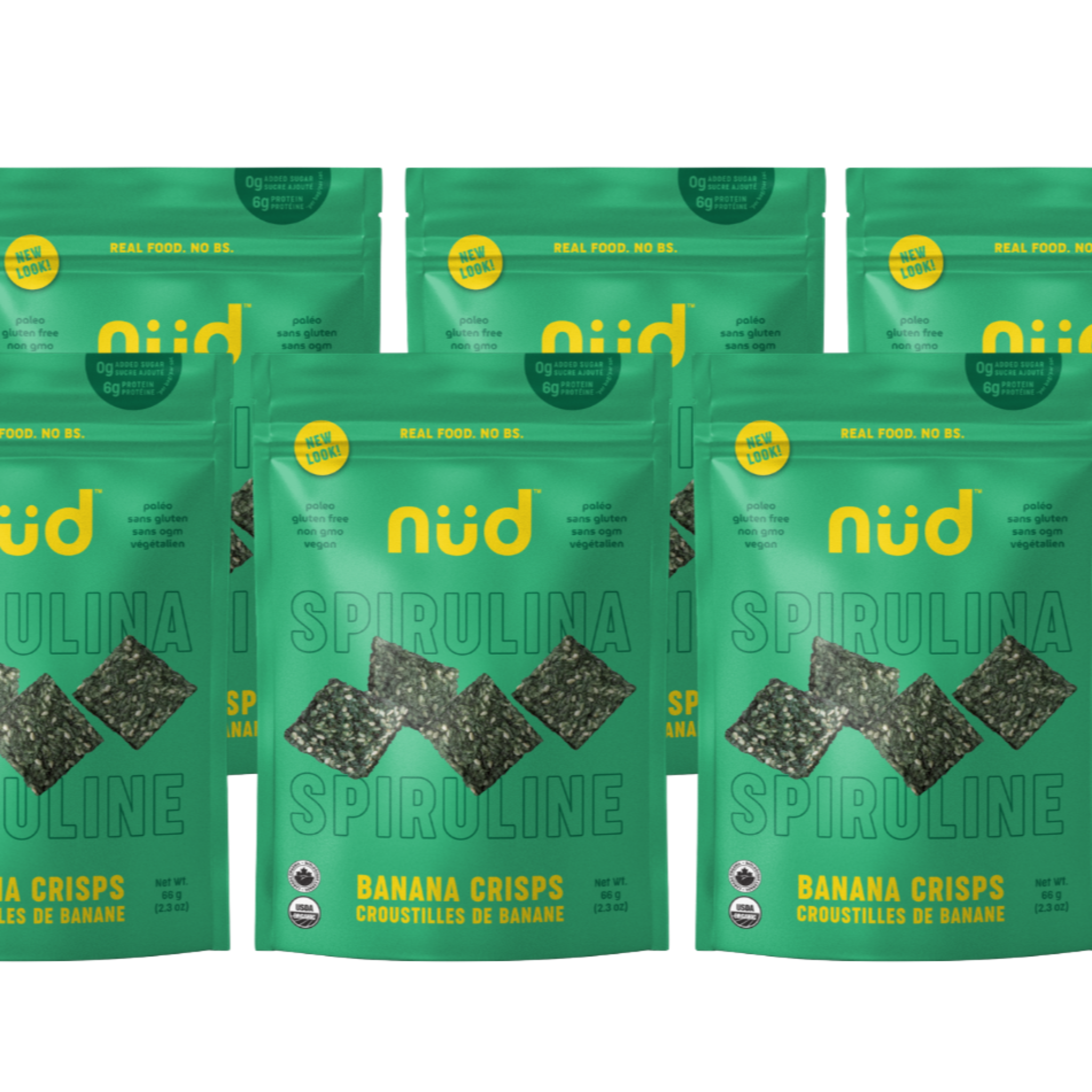 Multiple packages of nud Spirulina Banana Crisps on a white background