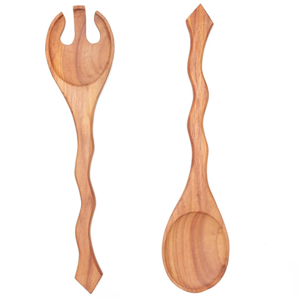 A photo of the hand-carved wooden salad serving set in both wood finishes