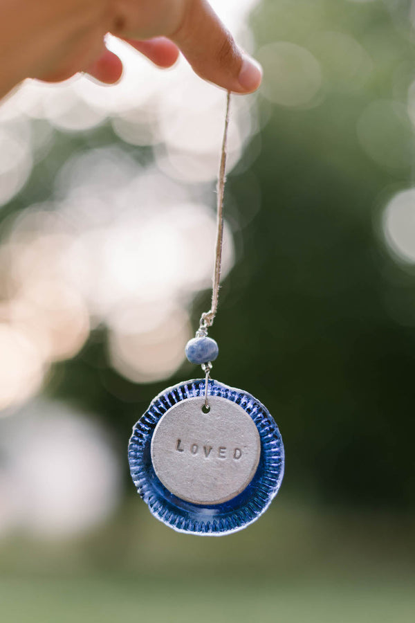 Upcycled Bottle Cap Ornament - A symbol of sustainability and second chances