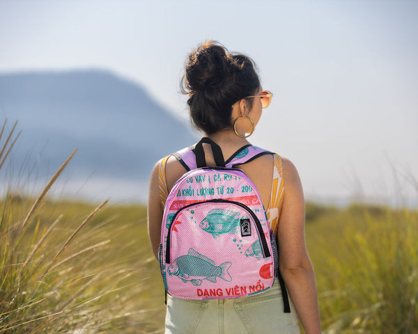 Scout Backpack: Carry your adventures with style & sustainability. Upcycled exterior, recycled interior, comfy & practical. Perfect for day trips, school, or eco-conscious gifts. Order Scout now!