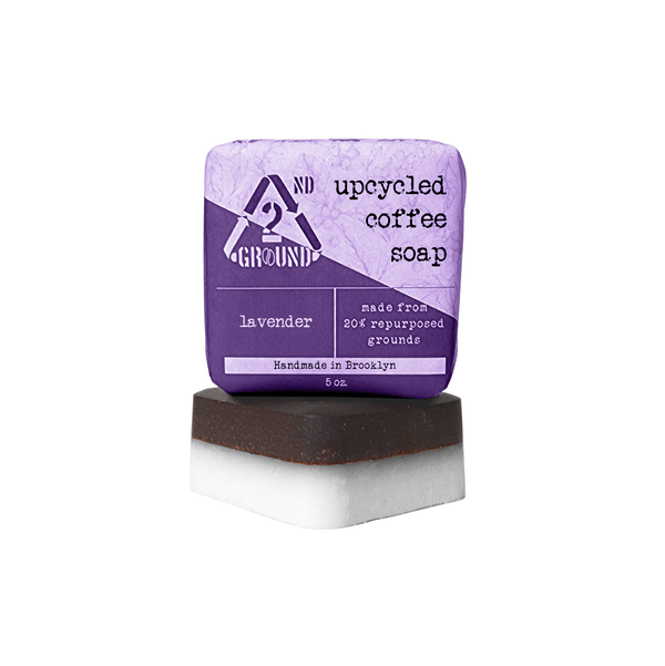 A close-up photo of the Coffee Soap bar, showing its coffee grounds and creamy texture. Description: Our Coffee Soap is made with all-natural ingredients, including coffee grounds, coconut oil, and shea butter. It is perfect for exfoliating and moisturizing your skin. lavender