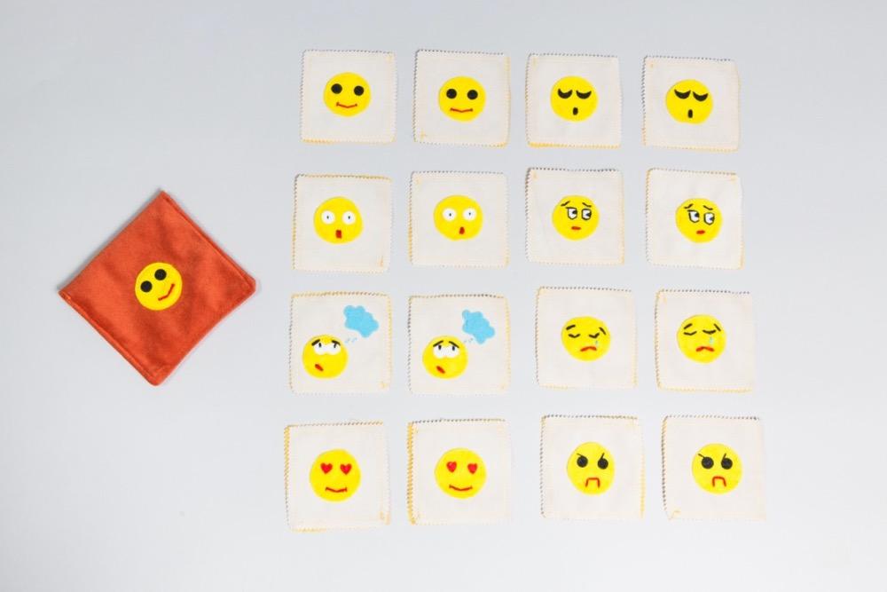A photo of the Emotions Memory Game pieces